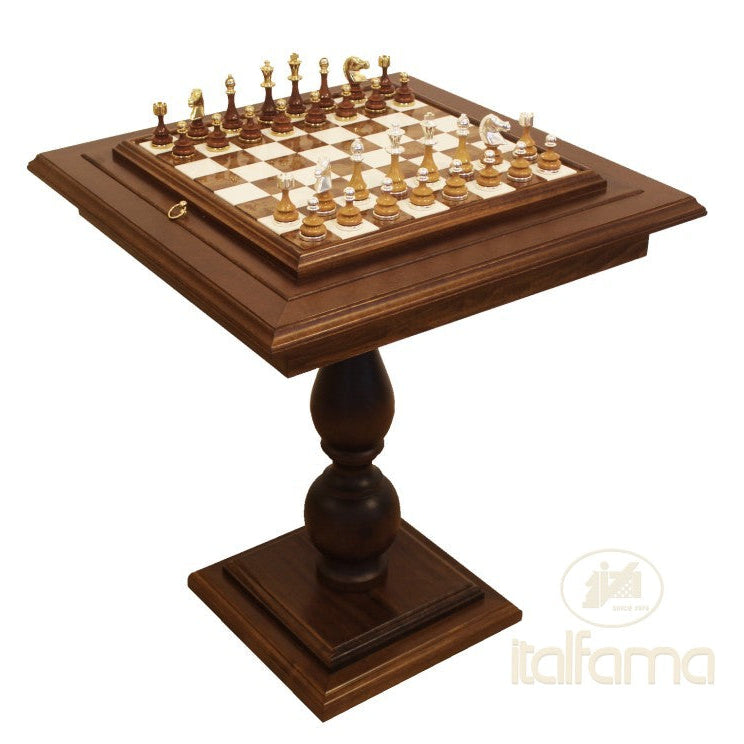 Wooden chessboard with pieces on a white background, featuring the Italfama brand.
