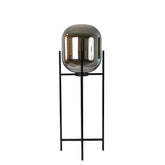 Floor lamp in grey smoked mirror-effect glass and black steel