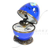 Loud blue musical egg with a little black and white cat by Fanex France - Main View