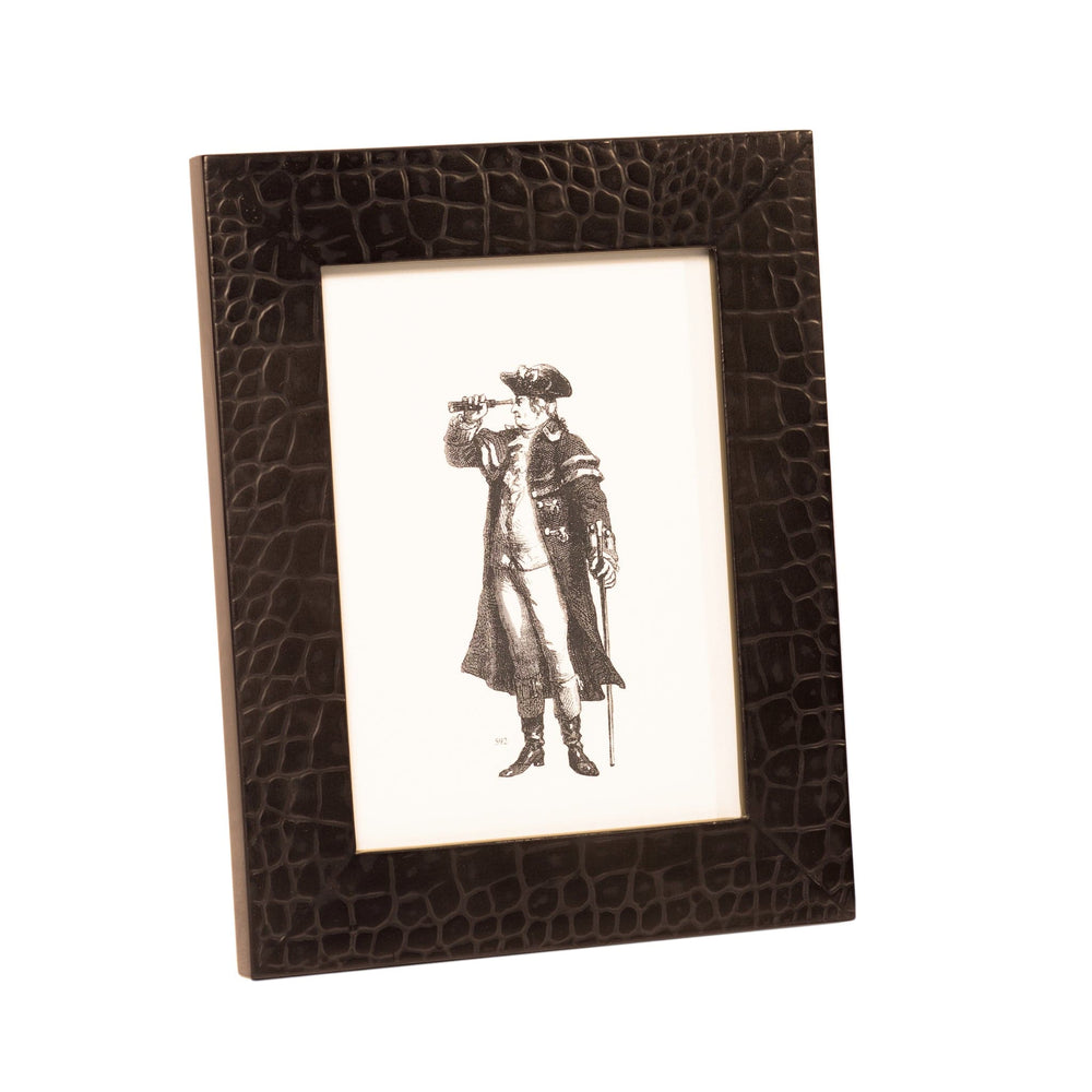 Faux crocodile leather picture frame with a framed illustration of a person in a coat and hat.