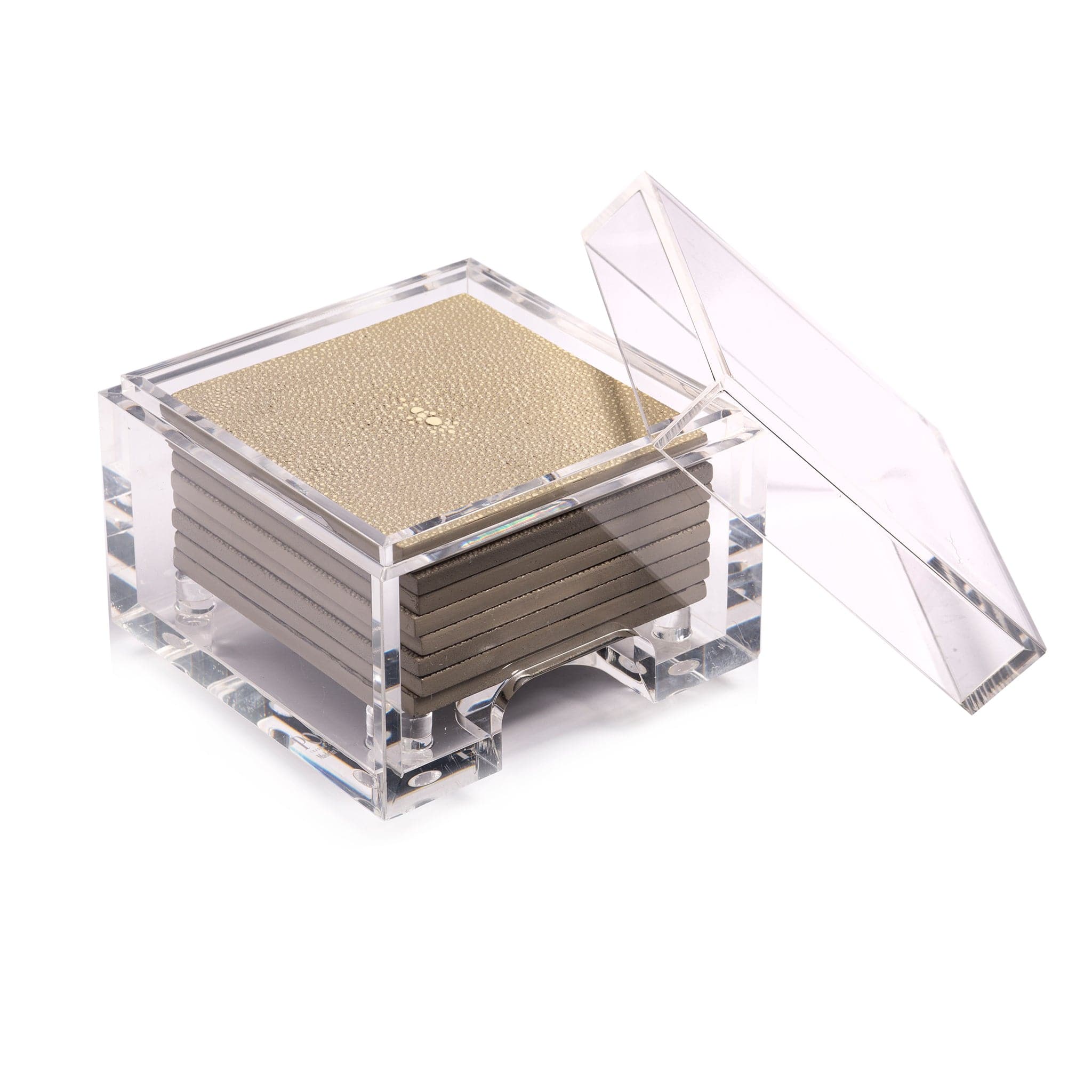Clear acrylic coaster set with gold coasters inside on a white background
