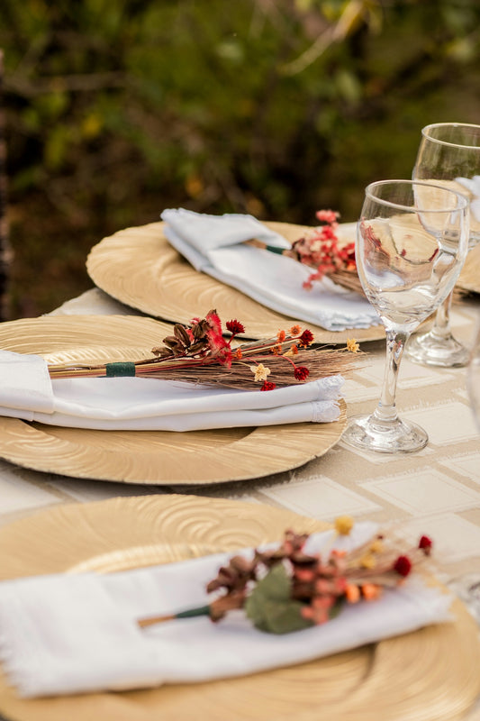 a close up of a table with place settings
