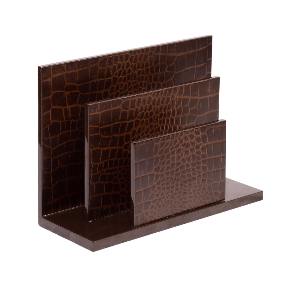 Brown crocodile patterned letter holder on a white background