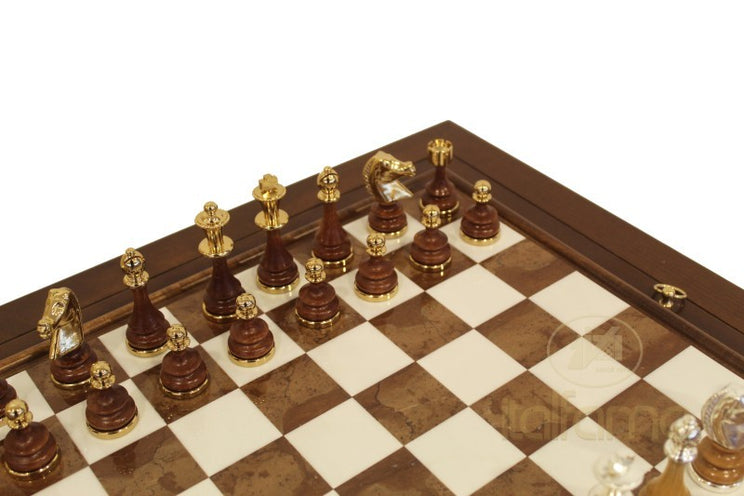 Wooden chessboard with pieces on a white background