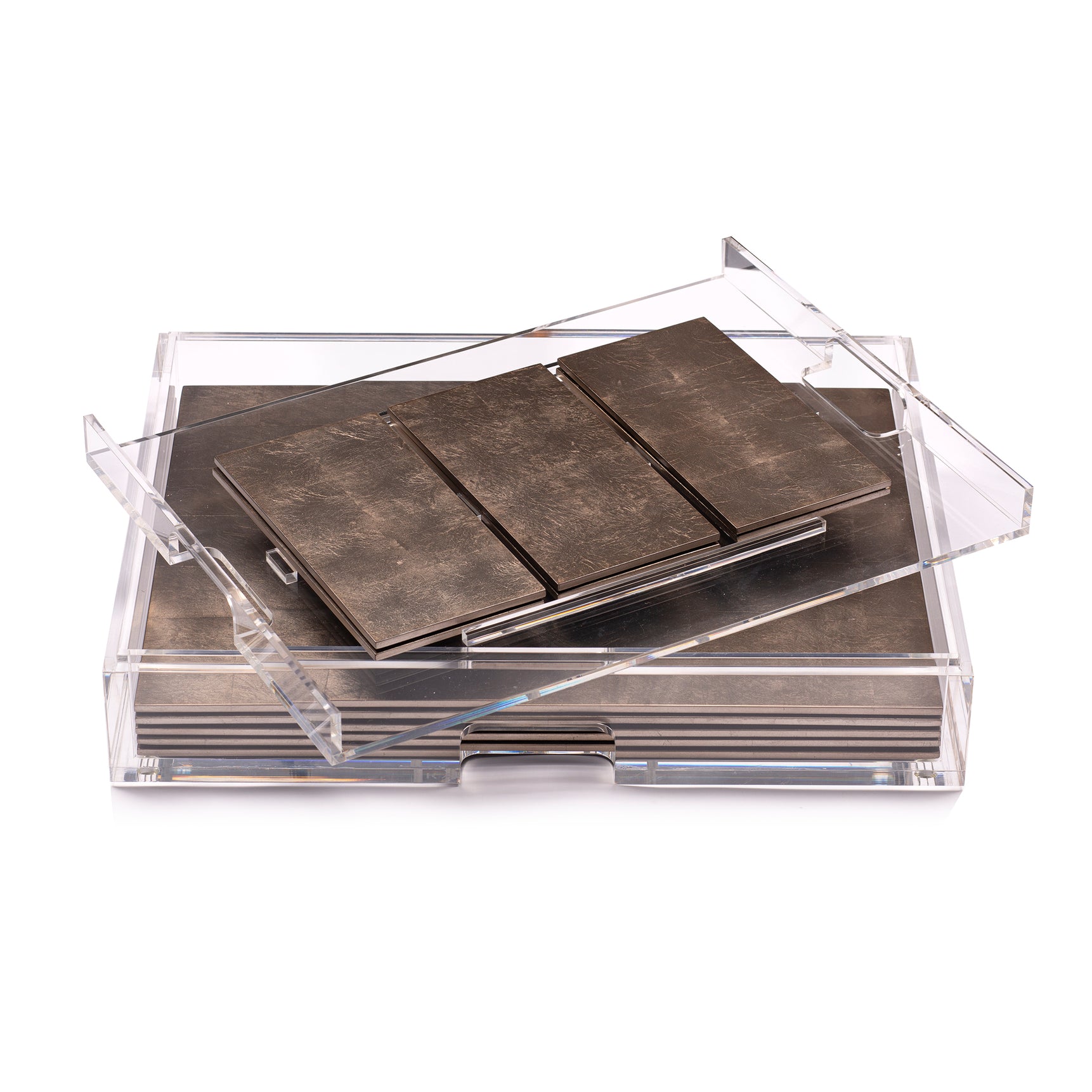 Set of metal tiles in a clear acrylic box on a white background
