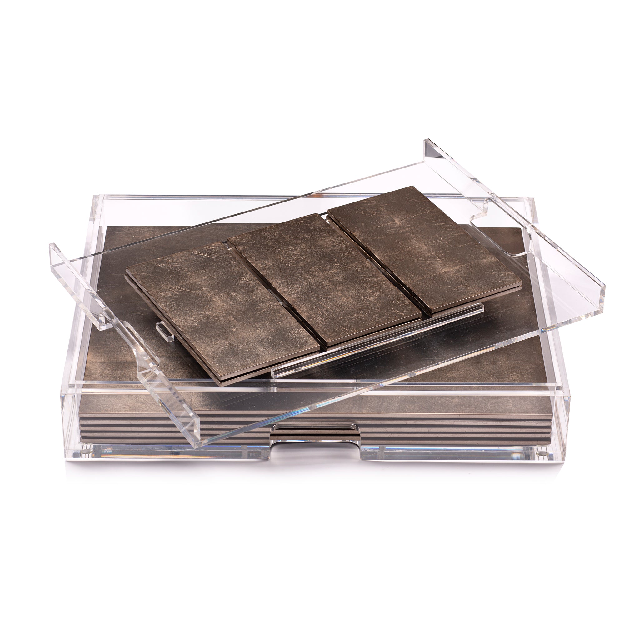 Set of metal tiles in a clear acrylic box on a white background
