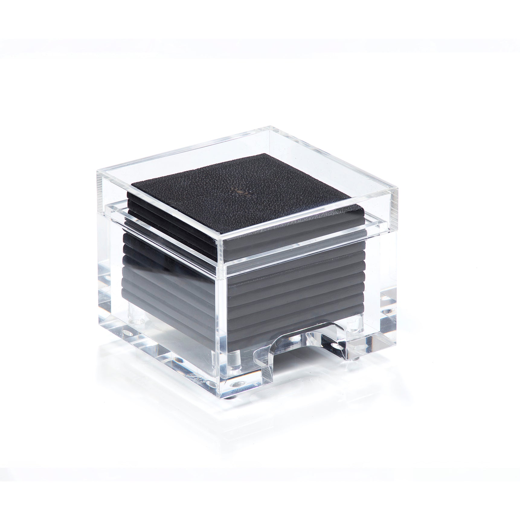 Set of black coasters with a clear acrylic holder on a white background