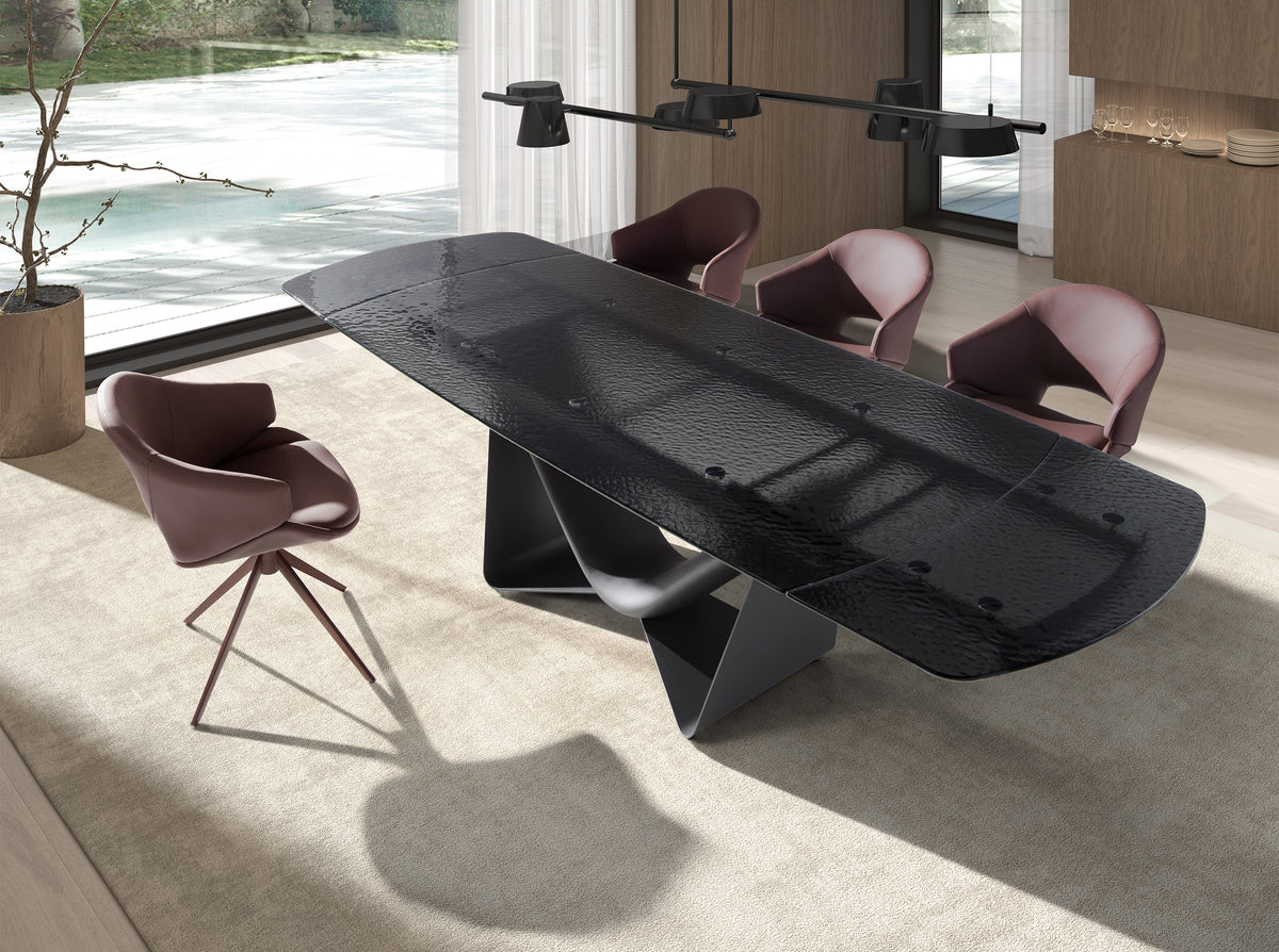 Extendable barrel oval dining table in black glass, steel, dark grey fiberglass and metal