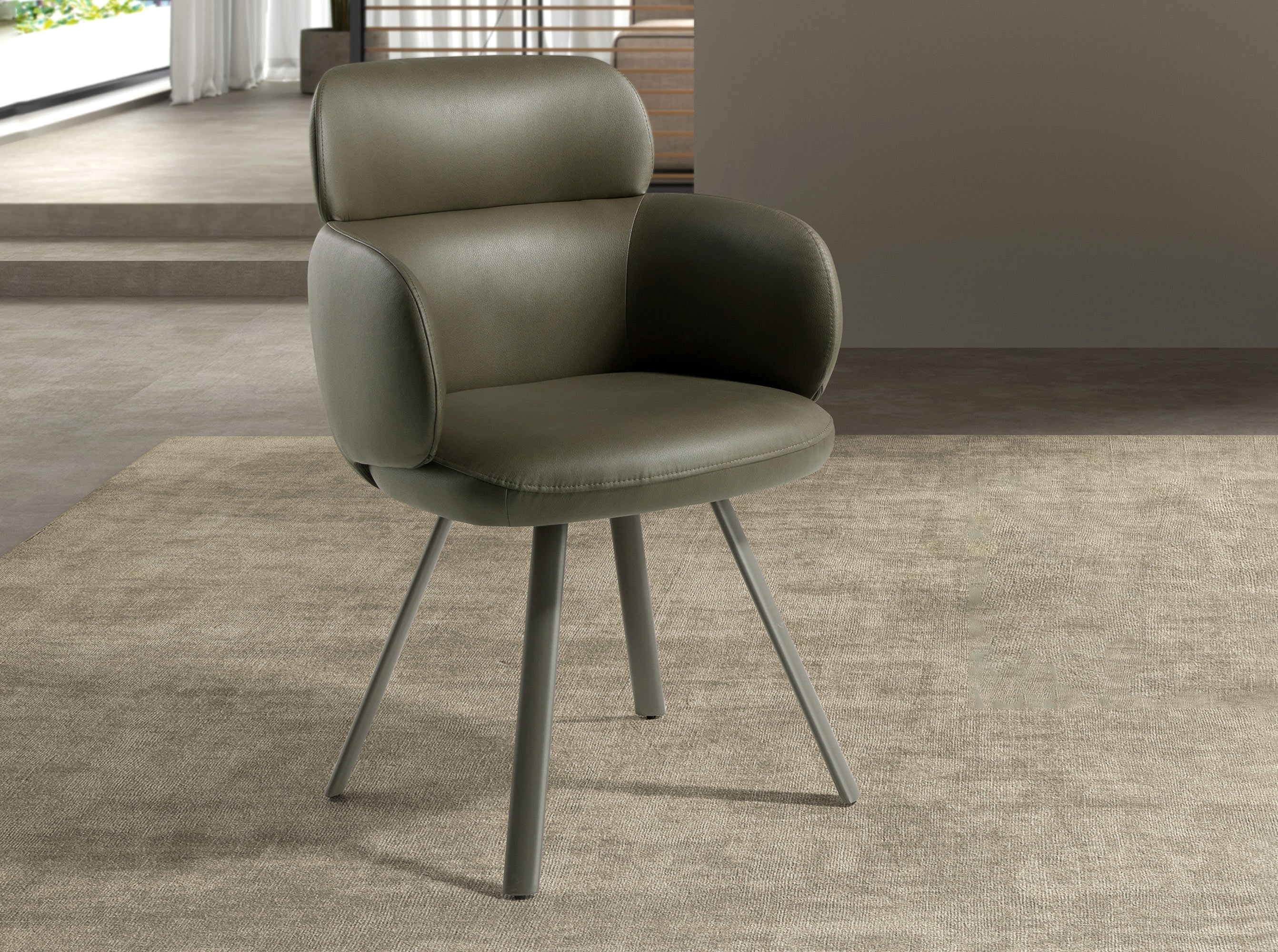 Swivel chair in olive green leatherette