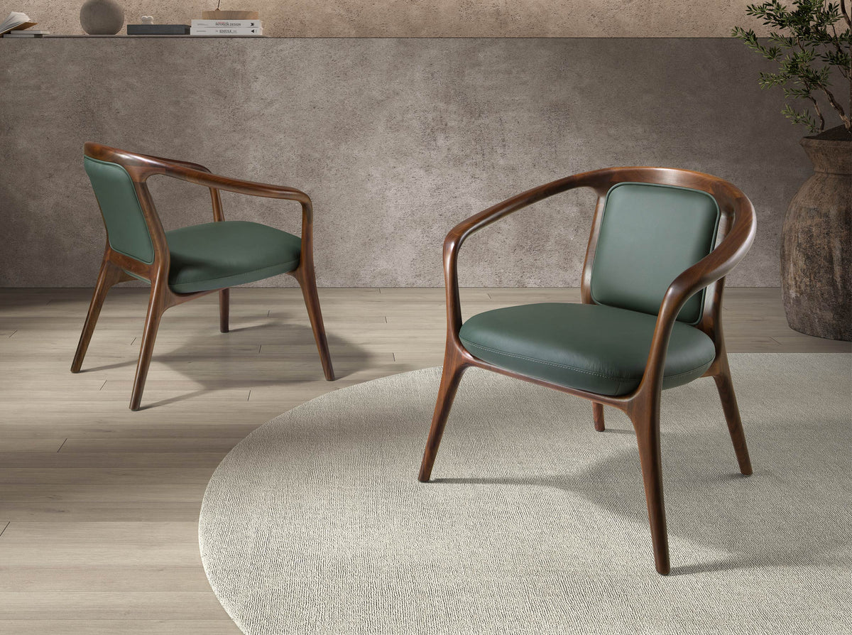 Dark green leatherette armchair
