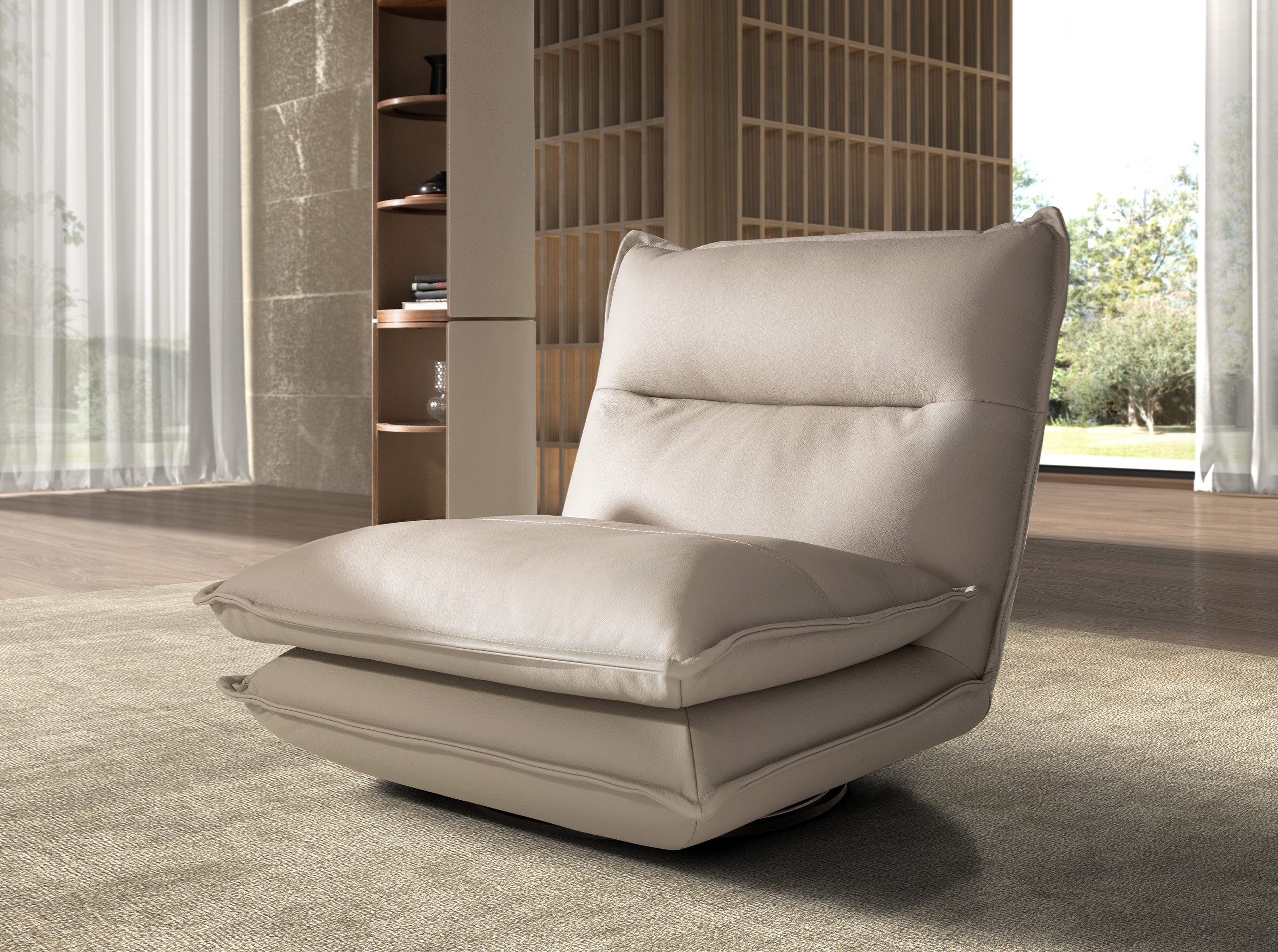 Taupe grey leather swivel armchair