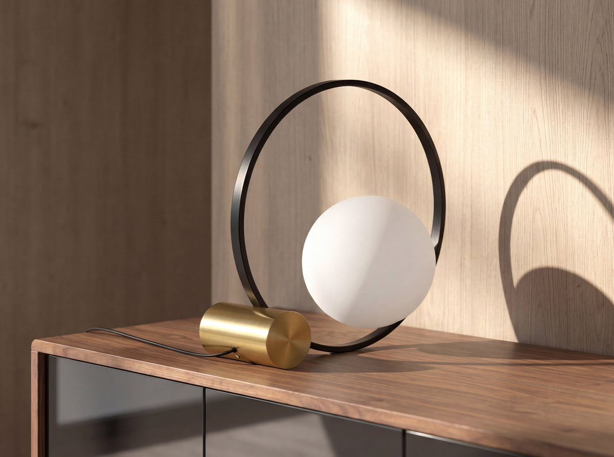 White glass and black steel table lamp with polished gold steel base