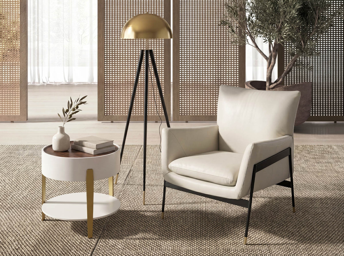 Polished gold steel and black steel floor lamp