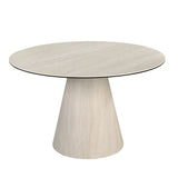 Round dining table in porcelain marble and wood covered with a flexible porcelain marble sheet