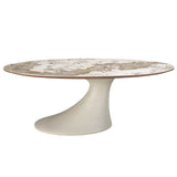 Oval dining table in porcelain marble and sand-coloured epoxy fiberglass