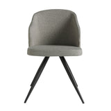 Chair upholstered in fabric with black steel legs
