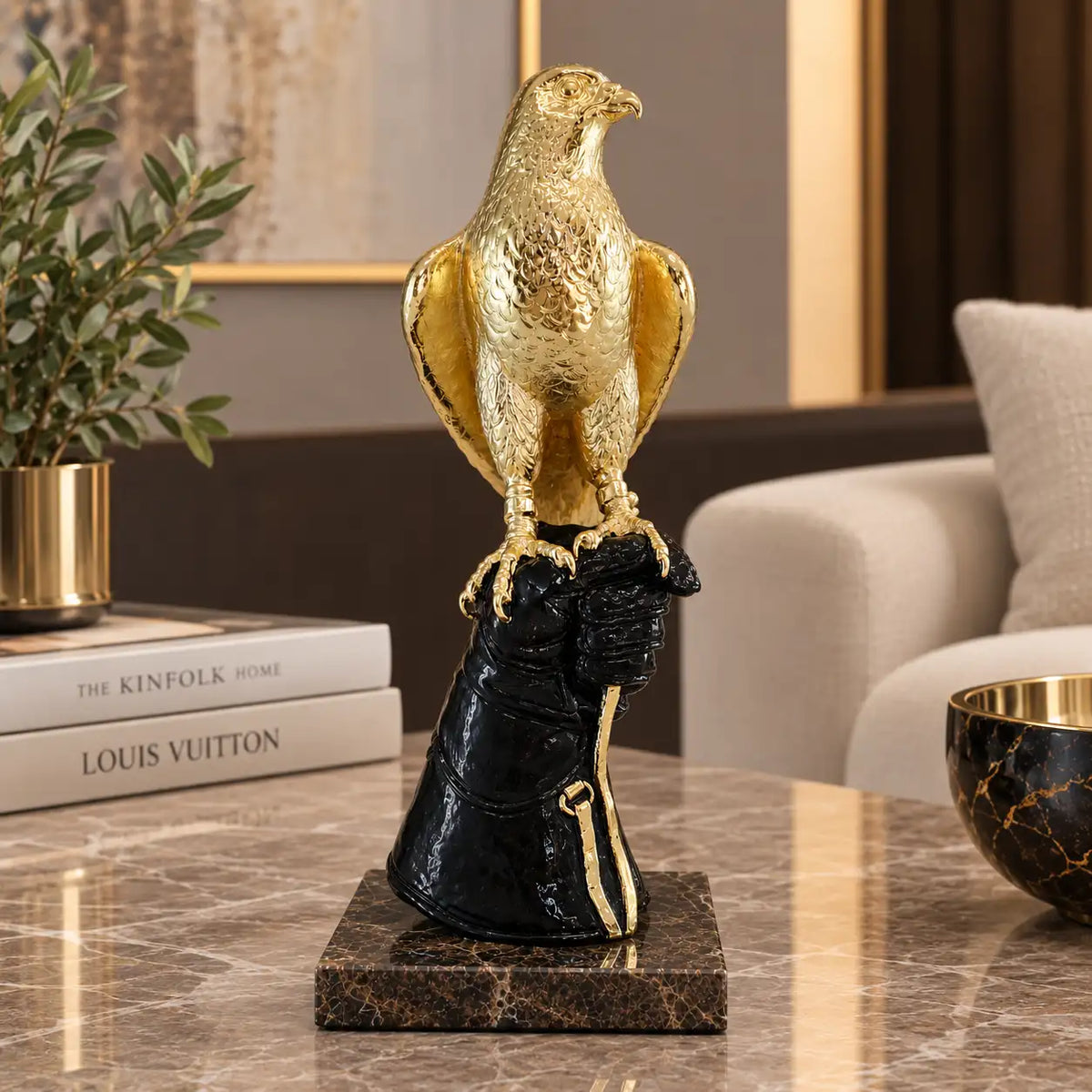 Golden Falcon on Hand Sculpture