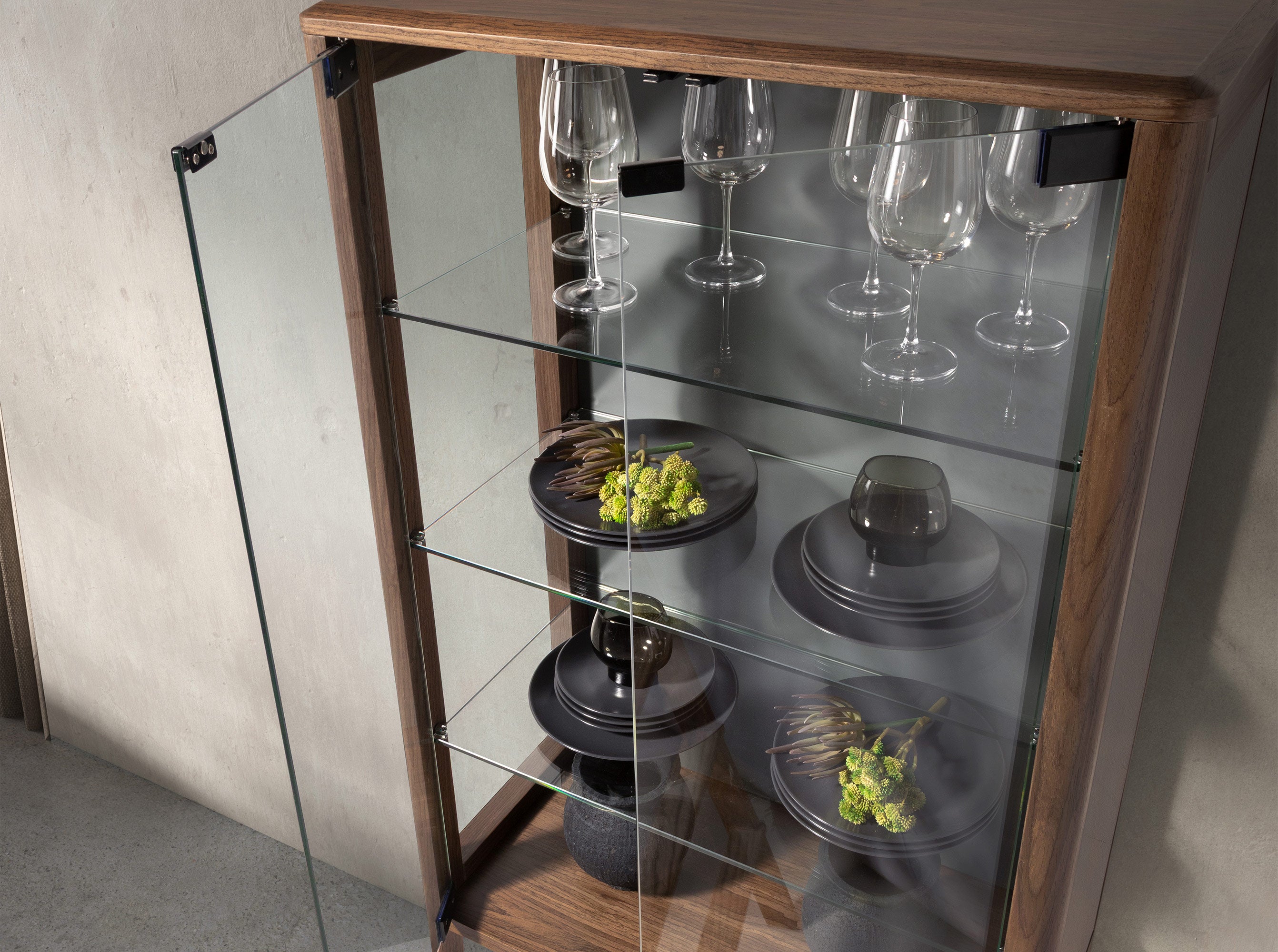 Tall sideboard in tempered glass and walnut with interior lighting