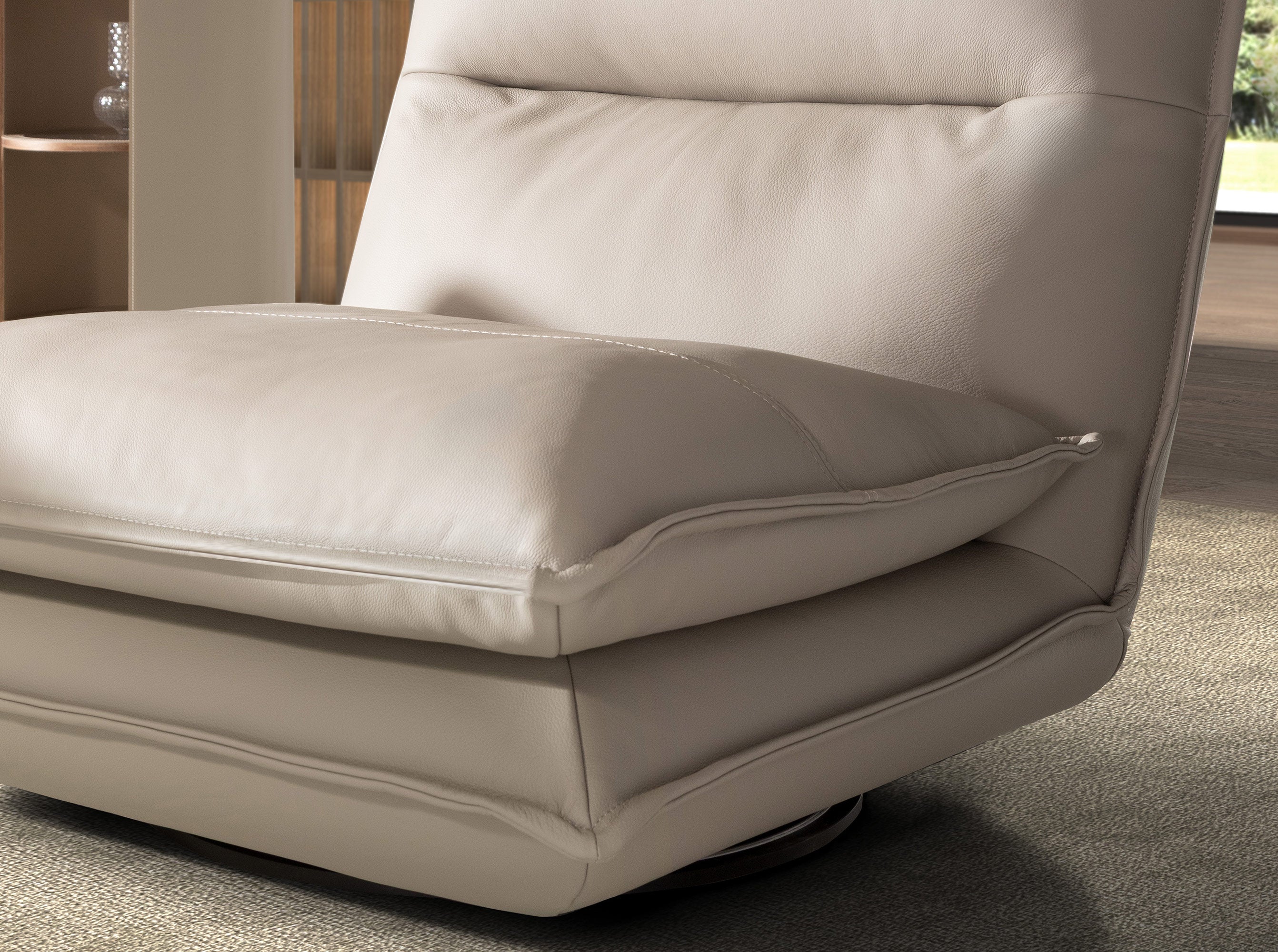 Taupe grey leather swivel armchair