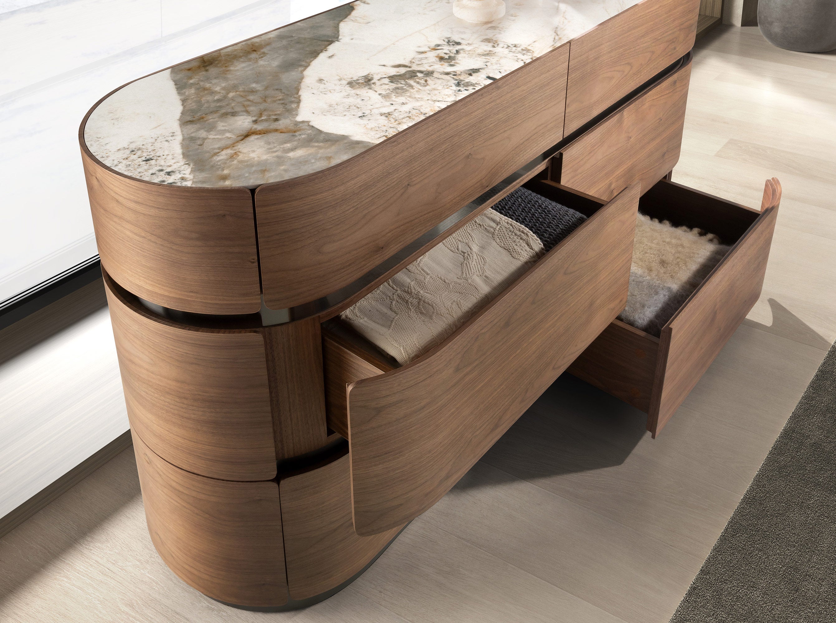 Chest of drawers in walnut, darkened steel base and porcelain marble top