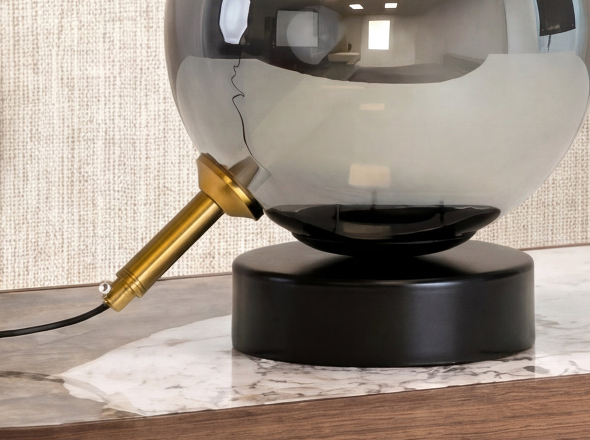 Grey smoked mirror-effect glass and black steel table lamp