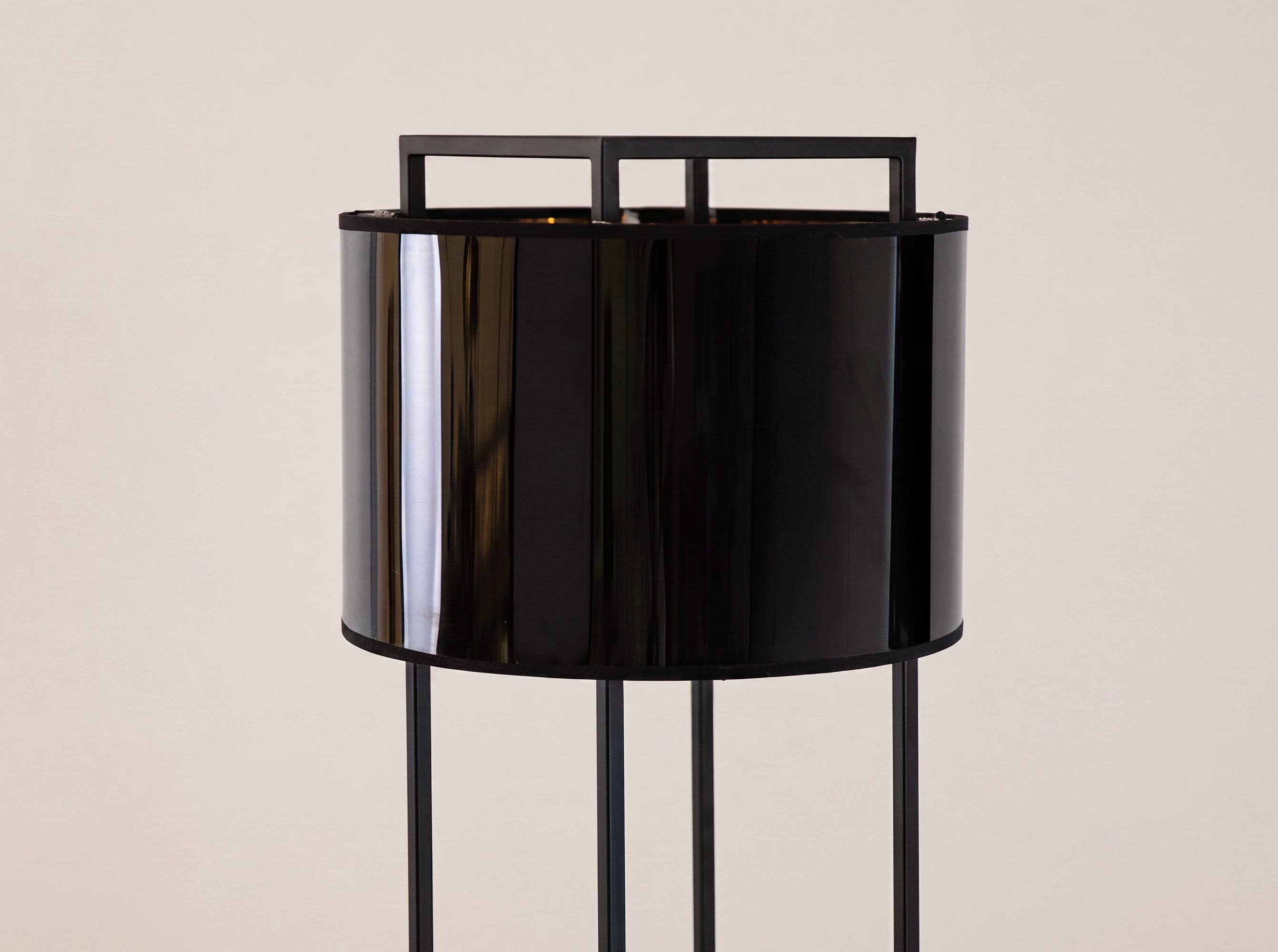 Floor lamp in black and glossy gold PVC and black steel