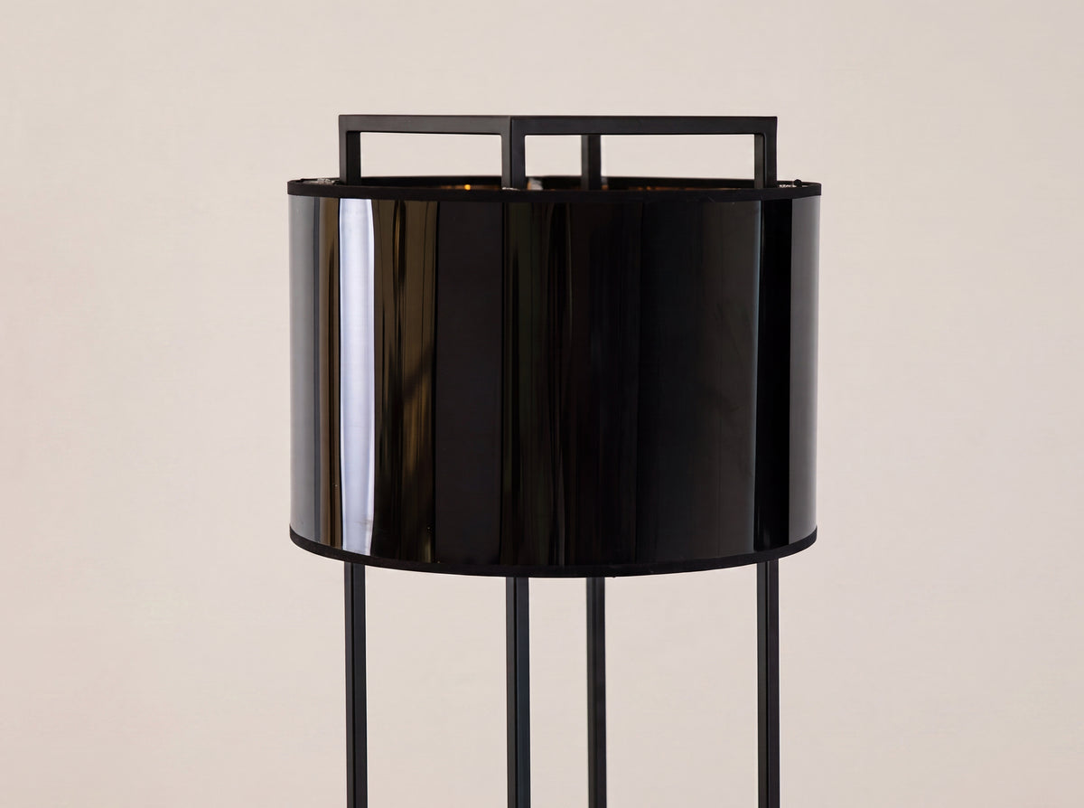 Floor lamp in black and glossy gold PVC and black steel