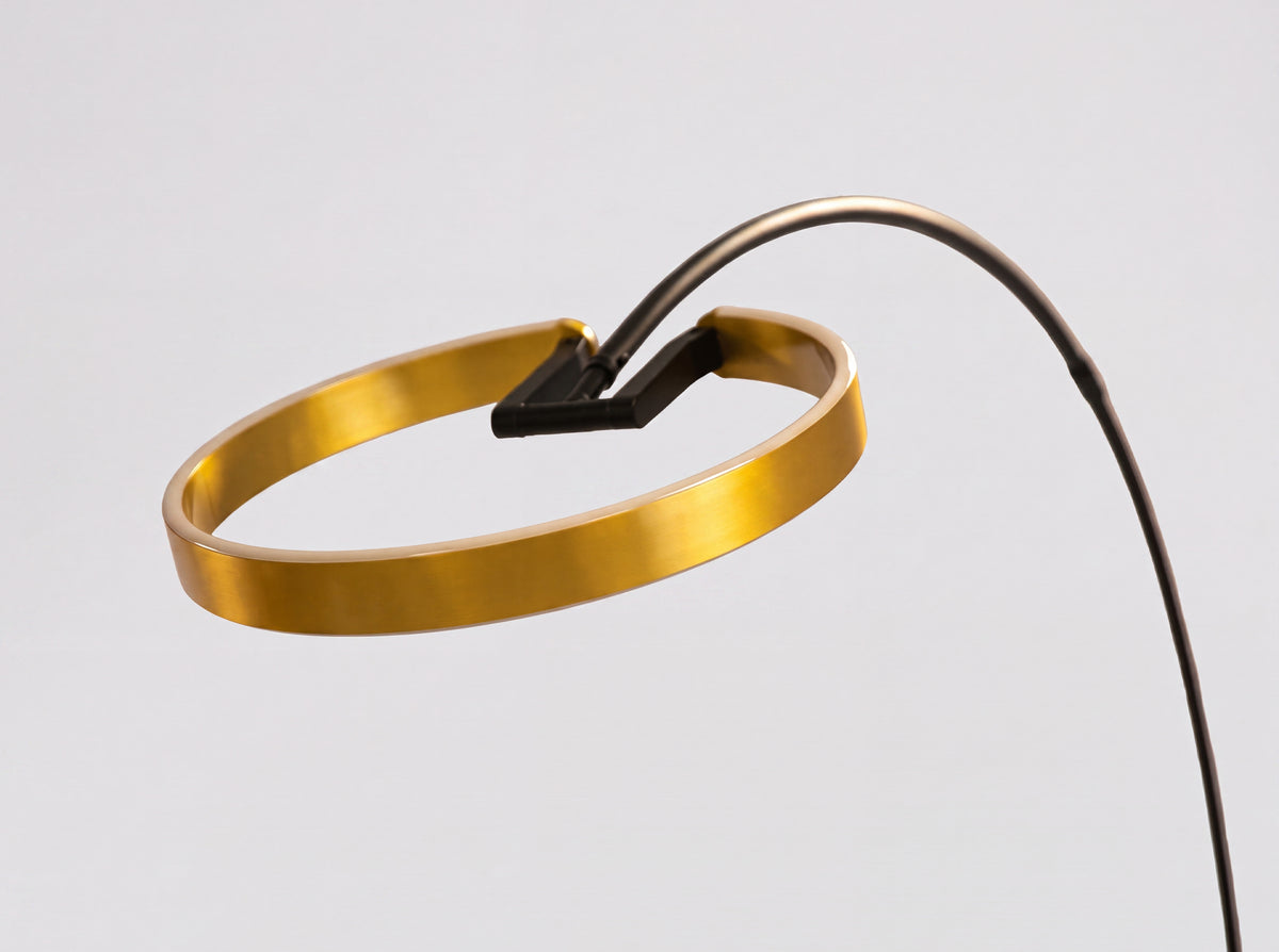 Floor lamp in polished gold steel and black steel