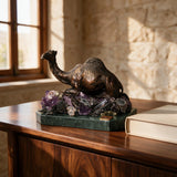 Seated Camel Sculpture — Bronze on Amethyst · 20 cm