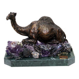 Seated Camel Sculpture — Bronze on Amethyst · 20 cm