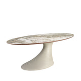Oval dining table in porcelain marble and sand-coloured epoxy fiberglass