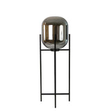 Floor lamp in grey smoked mirror-effect glass and black steel