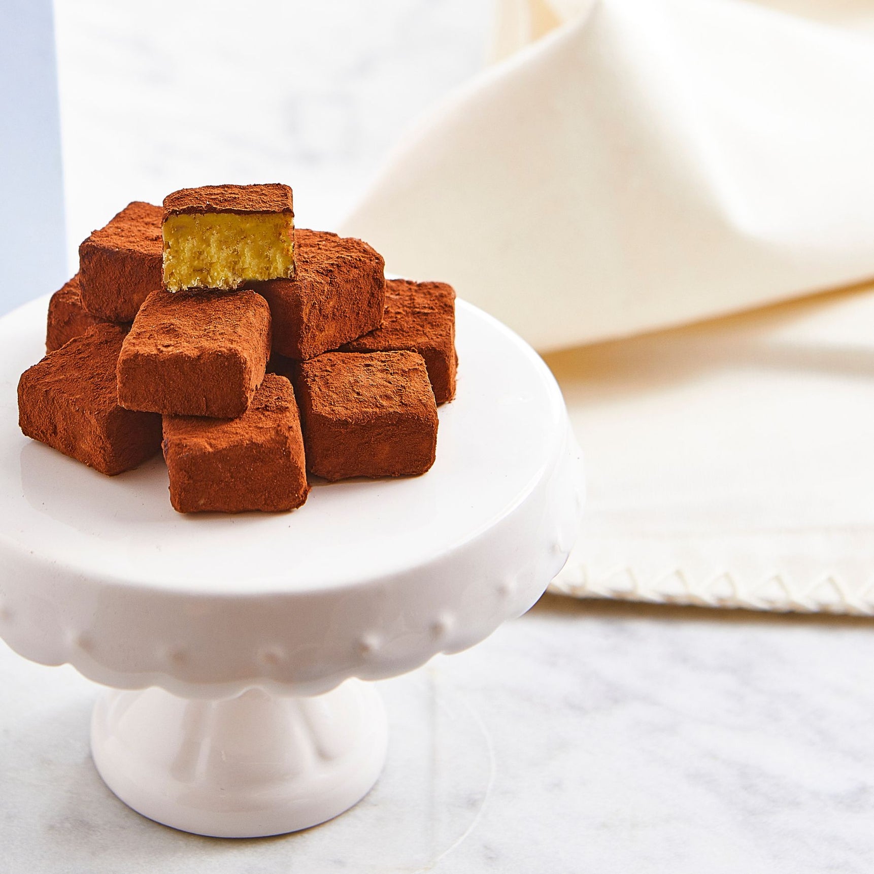 حلوى ناعمة بنكهة البرتقال الأحمر ومغطاة بمسحوق الكاكاو - 200 غرام