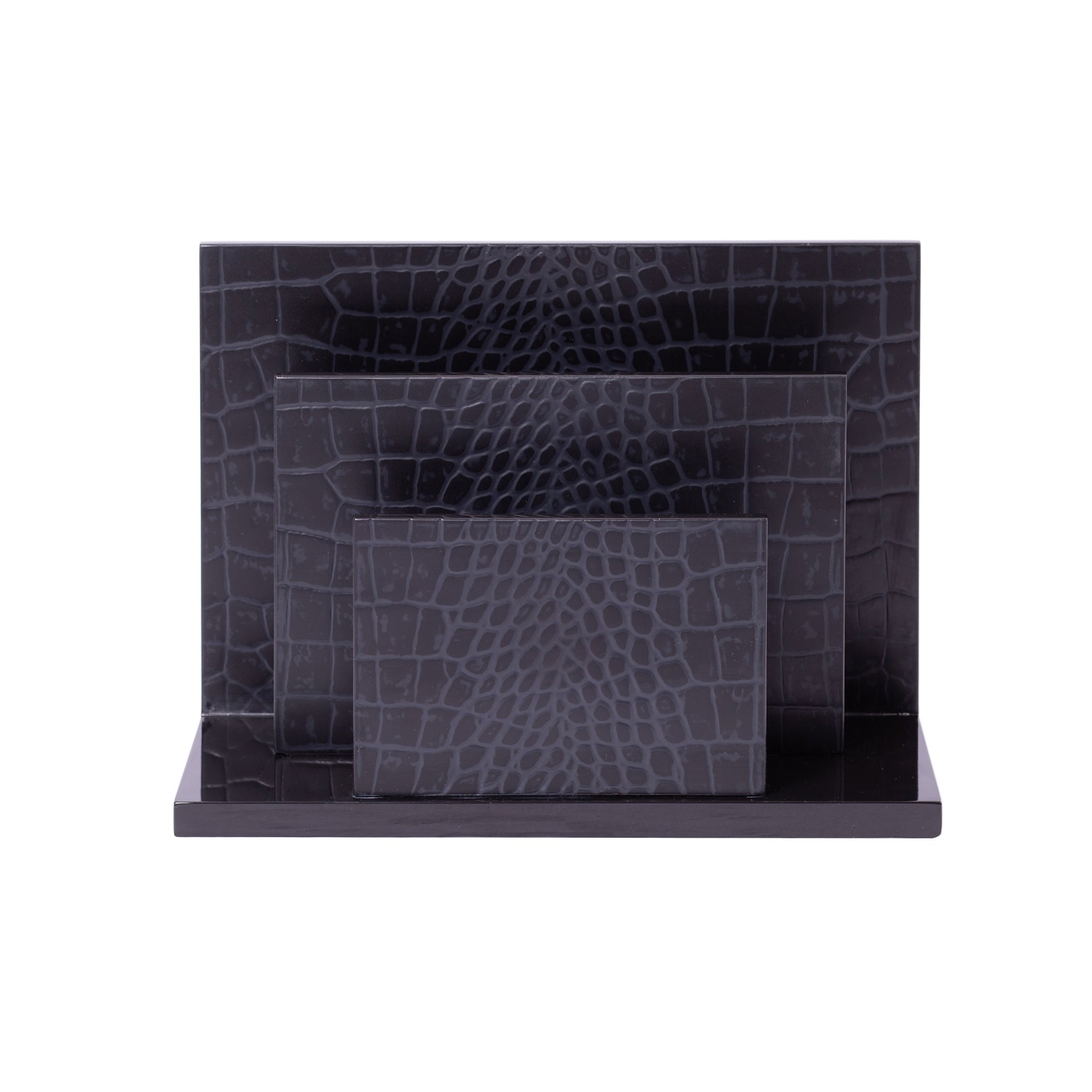 Black crocodile-patterned desk set on a white background