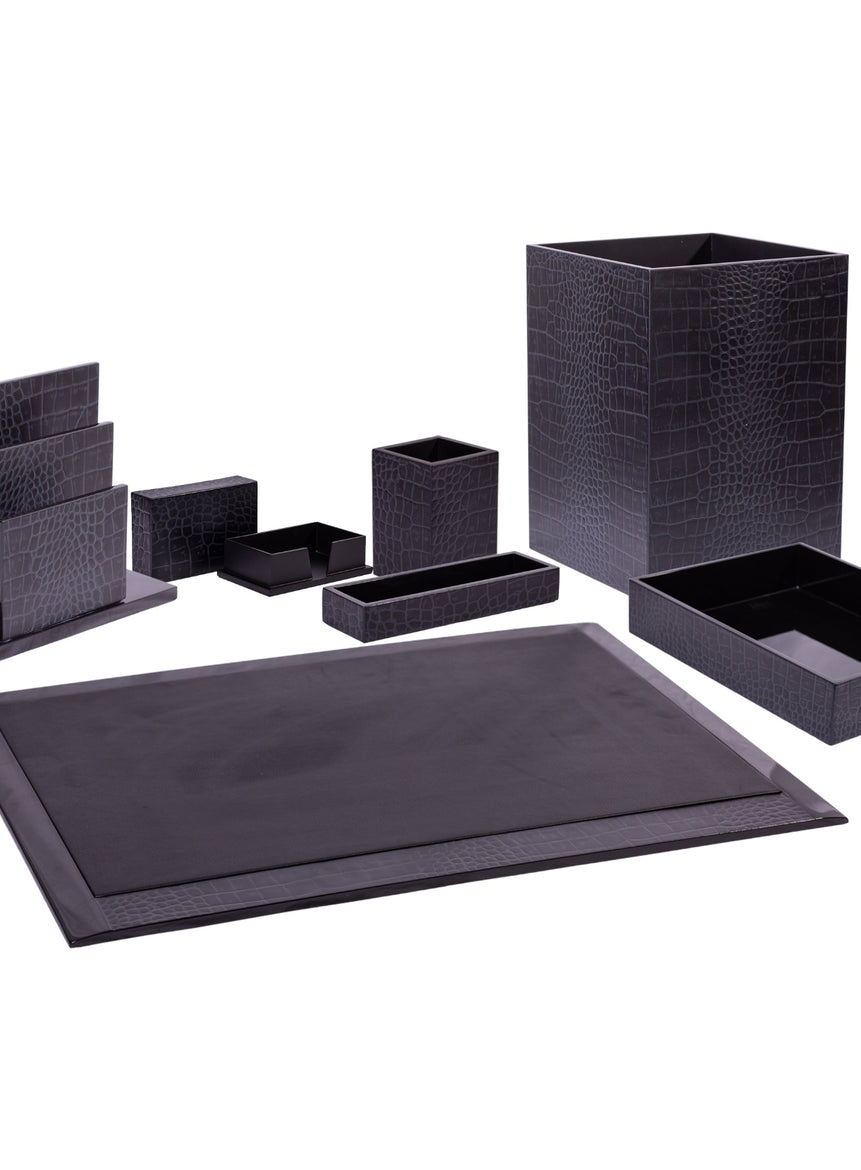 Black desk organizer set with various compartments on a white background