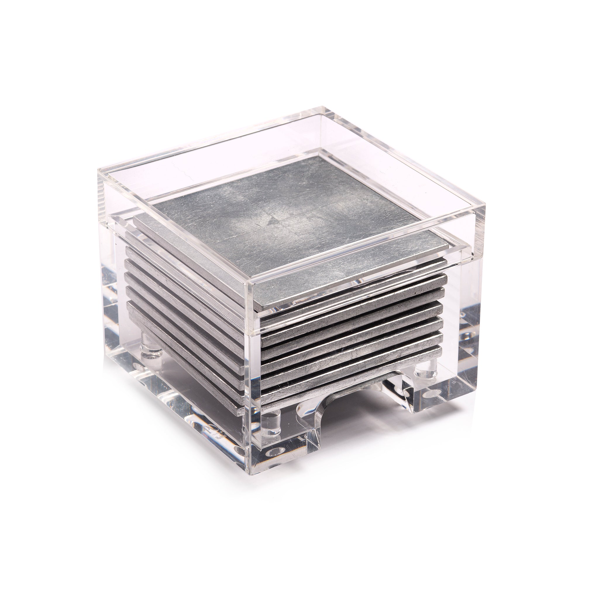 Stack of metal coasters in a clear acrylic holder on a white background
