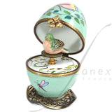 Pale green musical egg with a bird by Fanex France - Main View