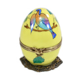 Yellow musical egg with a colorful bird by Fanex France - Alternate Angle